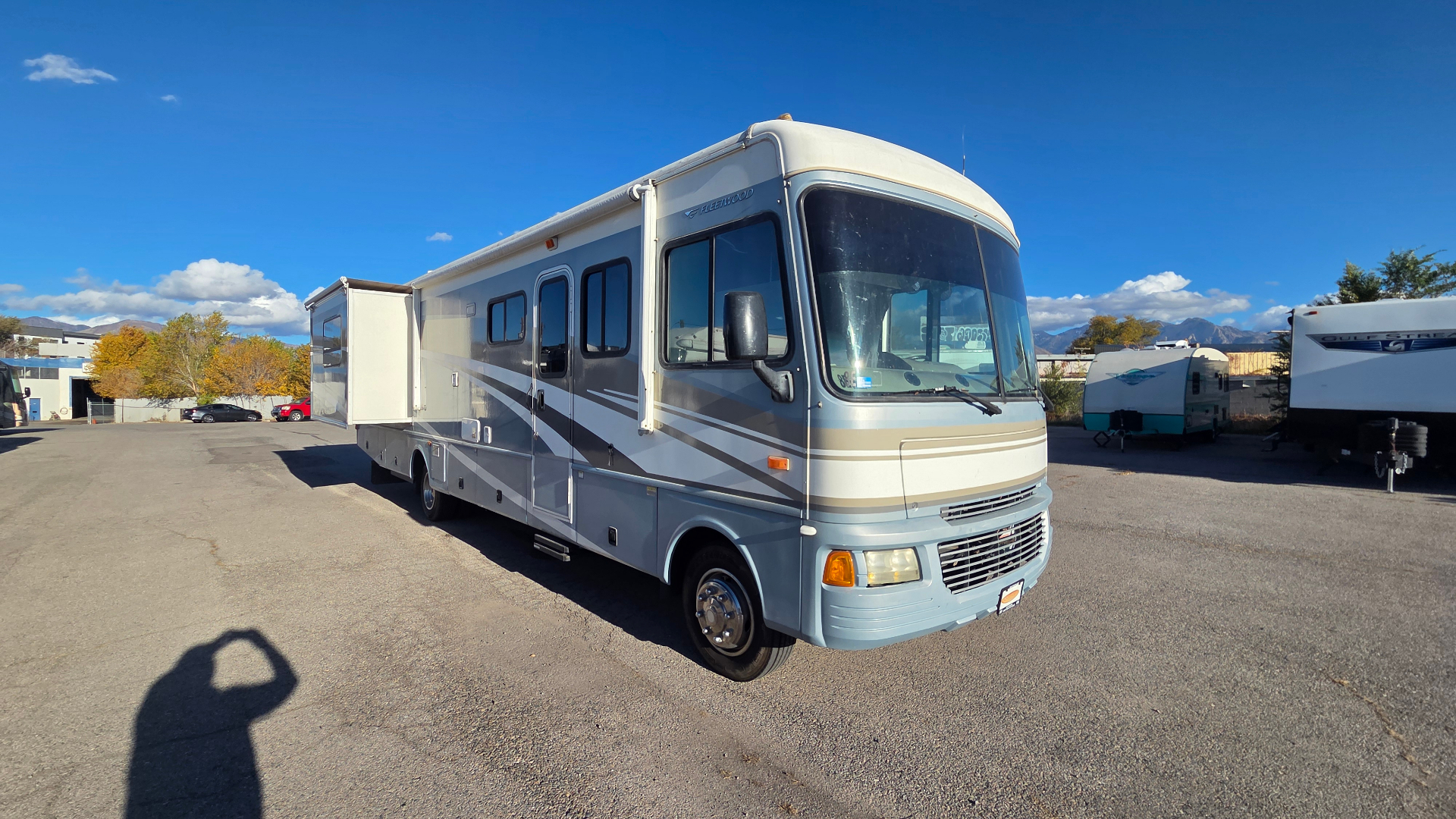 2005 Fleetwood Bounder 35E — front passenger side with slide-out extended