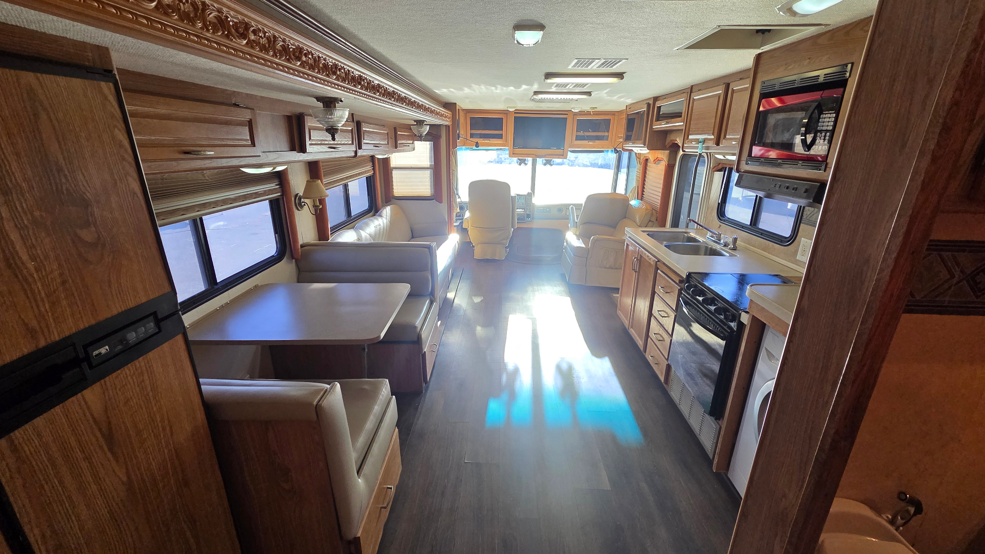 2005 Fleetwood Bounder 35E — interior looking forward, living area and kitchen